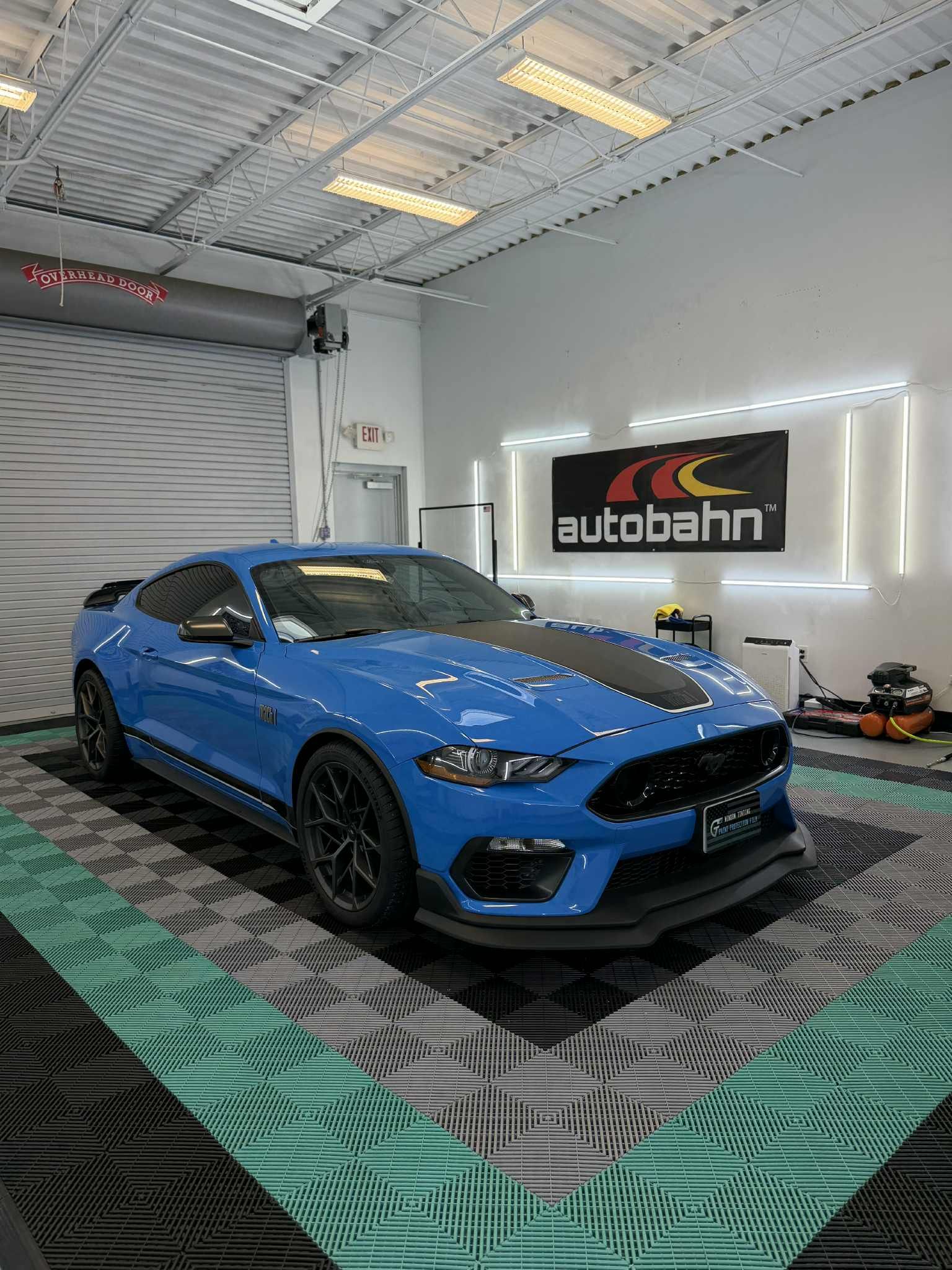 Blue sports car with Autobahn ceramic window tint at GT Tinting Hampton VA showroom