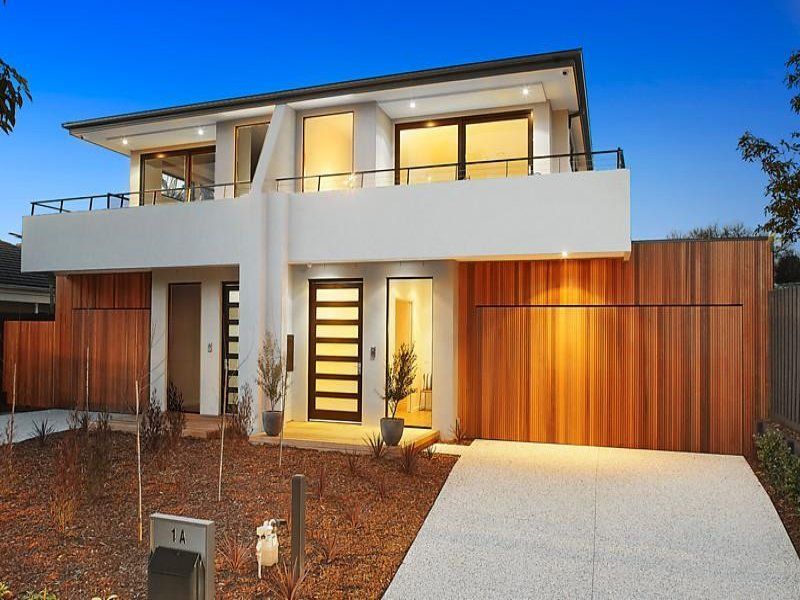 A modern house with a wooden garage door