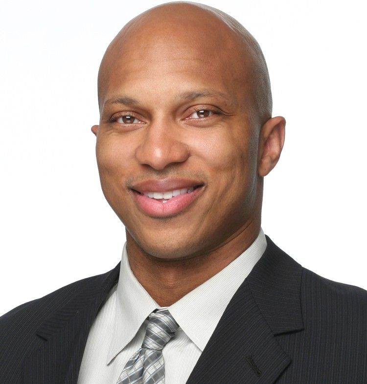 A blue and white icon representing fair housing  on a blue background.