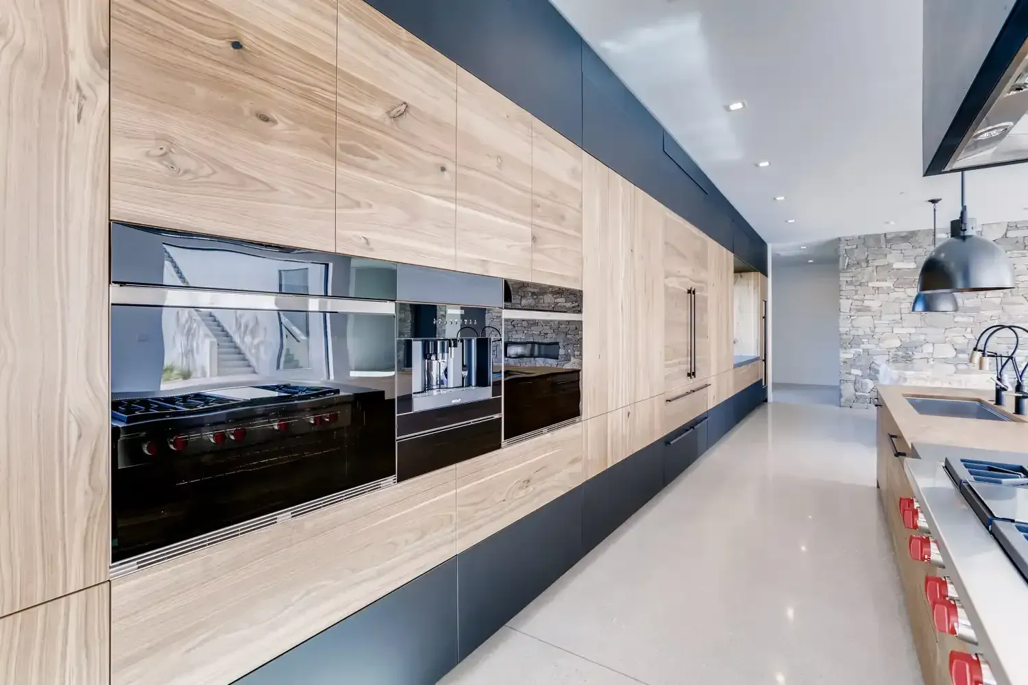 Mortgage Lender Bought Home walnut kitchen counters black appliances