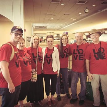 Group of people wearing red 