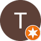 Der Buchstabe T befindet sich in einem braunen Kreis mit einem orangefarbenen Stern.