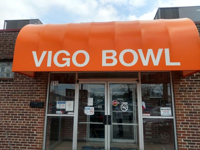 An orange awning over the entrance to vigo bowl