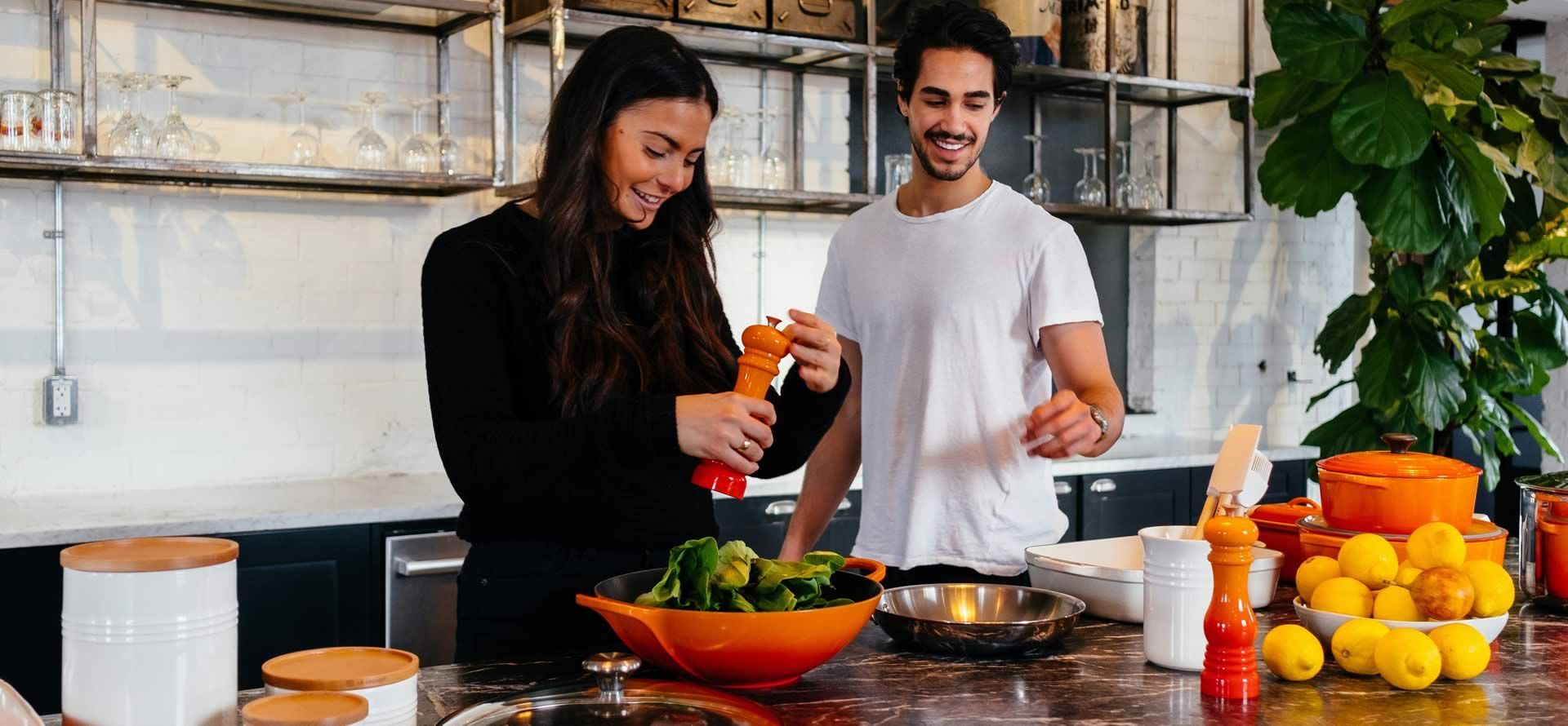 A couple prepping food.