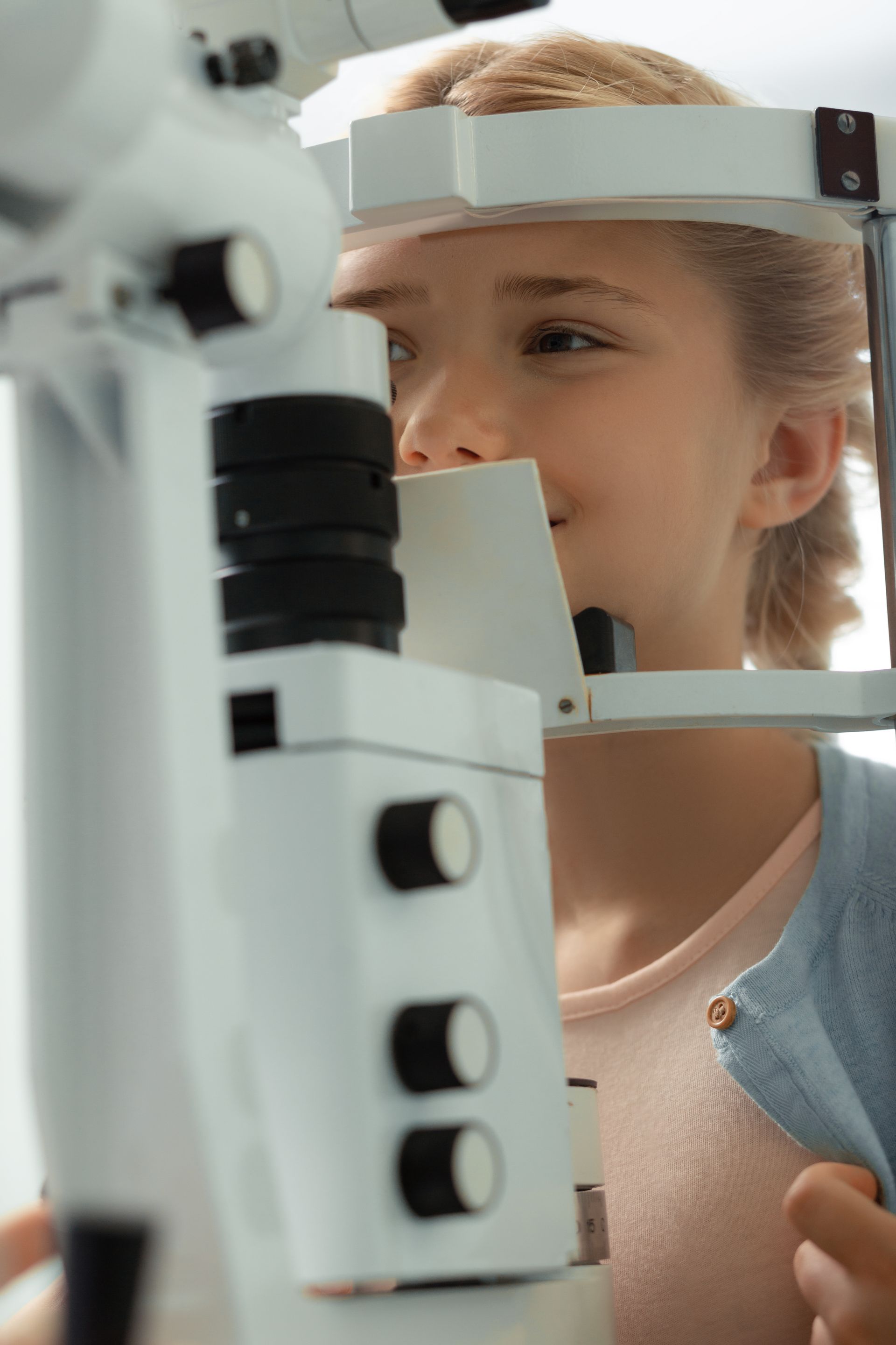 young woman at eye exam