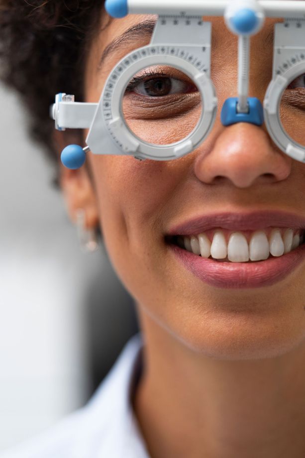 A woman is getting her eyes checked by an ophthalmologist.