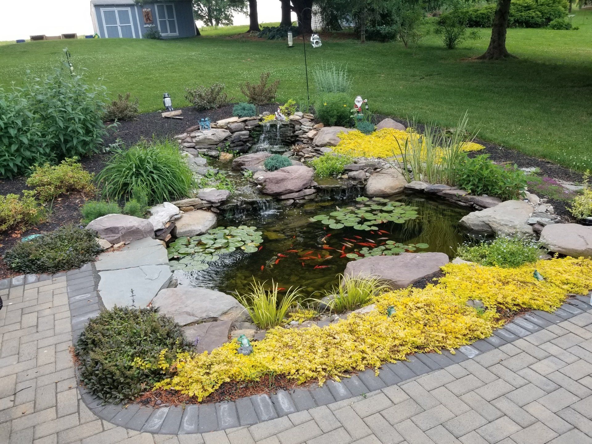 Beautiful Flowering Plants Around the Fountain — Red Lion, PA — Garden Creations LLC