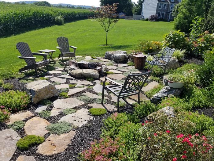 Outdoor Fire Feature Surrounded by Chairs — Red Lion, PA — Garden Creations LLC