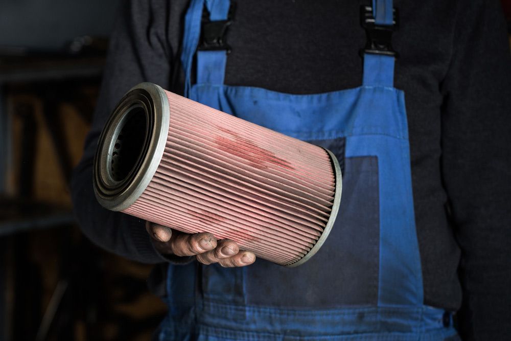 Car Mechanic Hand With Air Filter For Car — Bearfast Bearquip In Gunnedah NSW