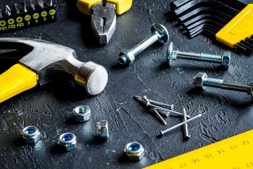Different Kind Of Tools With Hammer, Fasteners And Nails — Bearfast Bearquip In Taminda NSW
