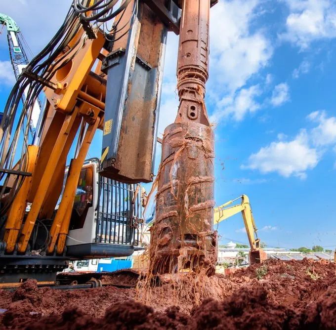 Earth Drilling Machine Into A Construction Site For Drilling Piles — Bearfast Bearquip In Taminda NSW