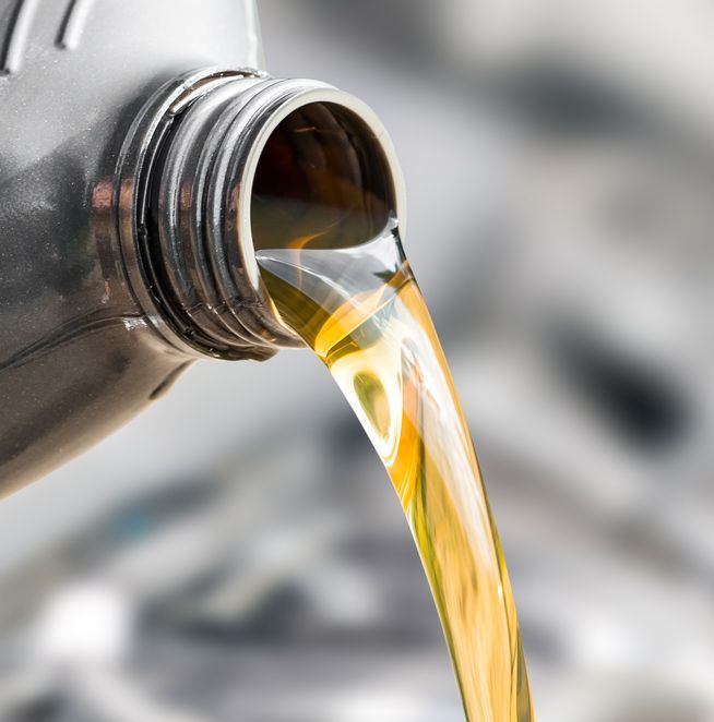 Pouring Oil To Car Engine — Bearfast Bearquip In Taminda NSW