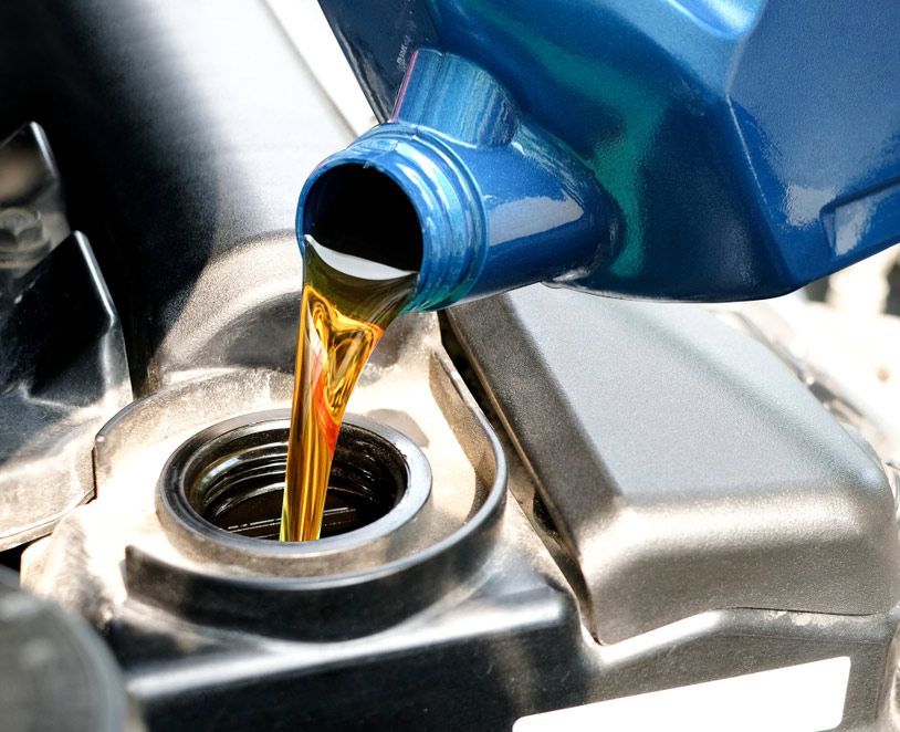 Refueling And Pouring Oil Quality Into The Engine Motor Car Transmission — Bearfast Bearquip In Taminda NSW