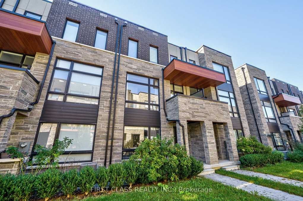 A brick apartment building with a lot of windows