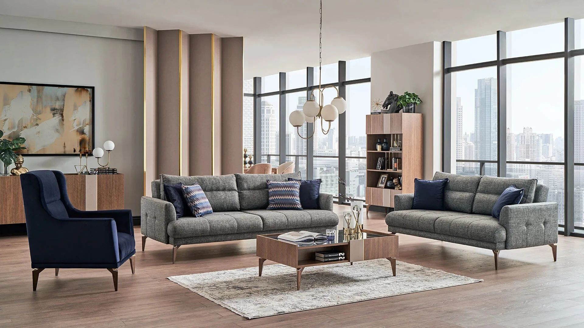 Grey sofas and Navy Blue accent chair in a Toronto Condo - cheap furniture delivery service