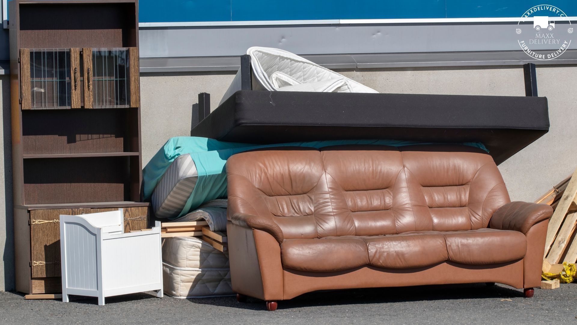 A brown leather couch is surrounded by other furniture