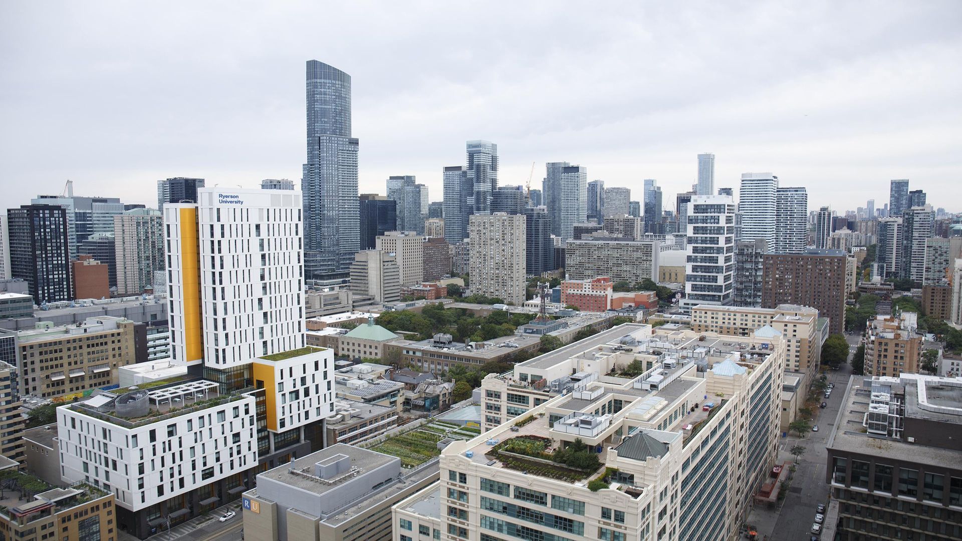 An aerial view of a city with lots of tall buildings