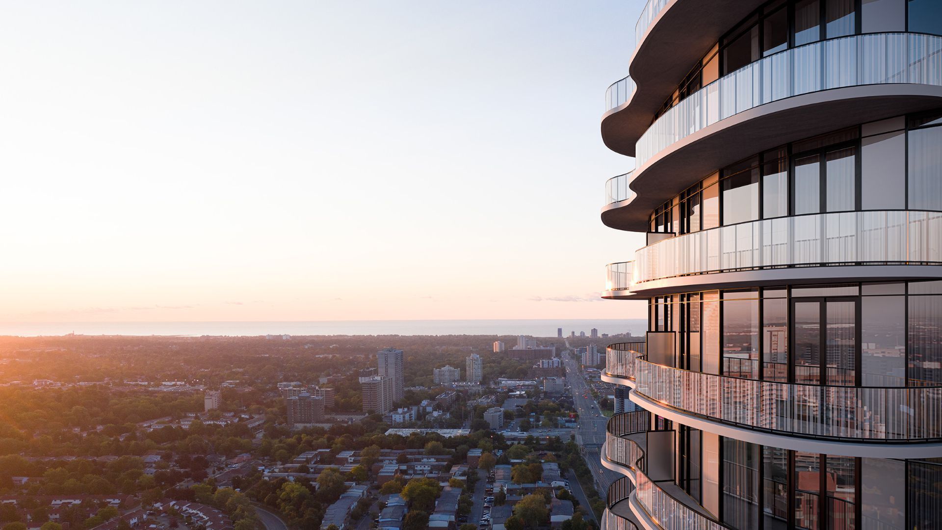 A large building with a lot of windows and balconies overlooking a city