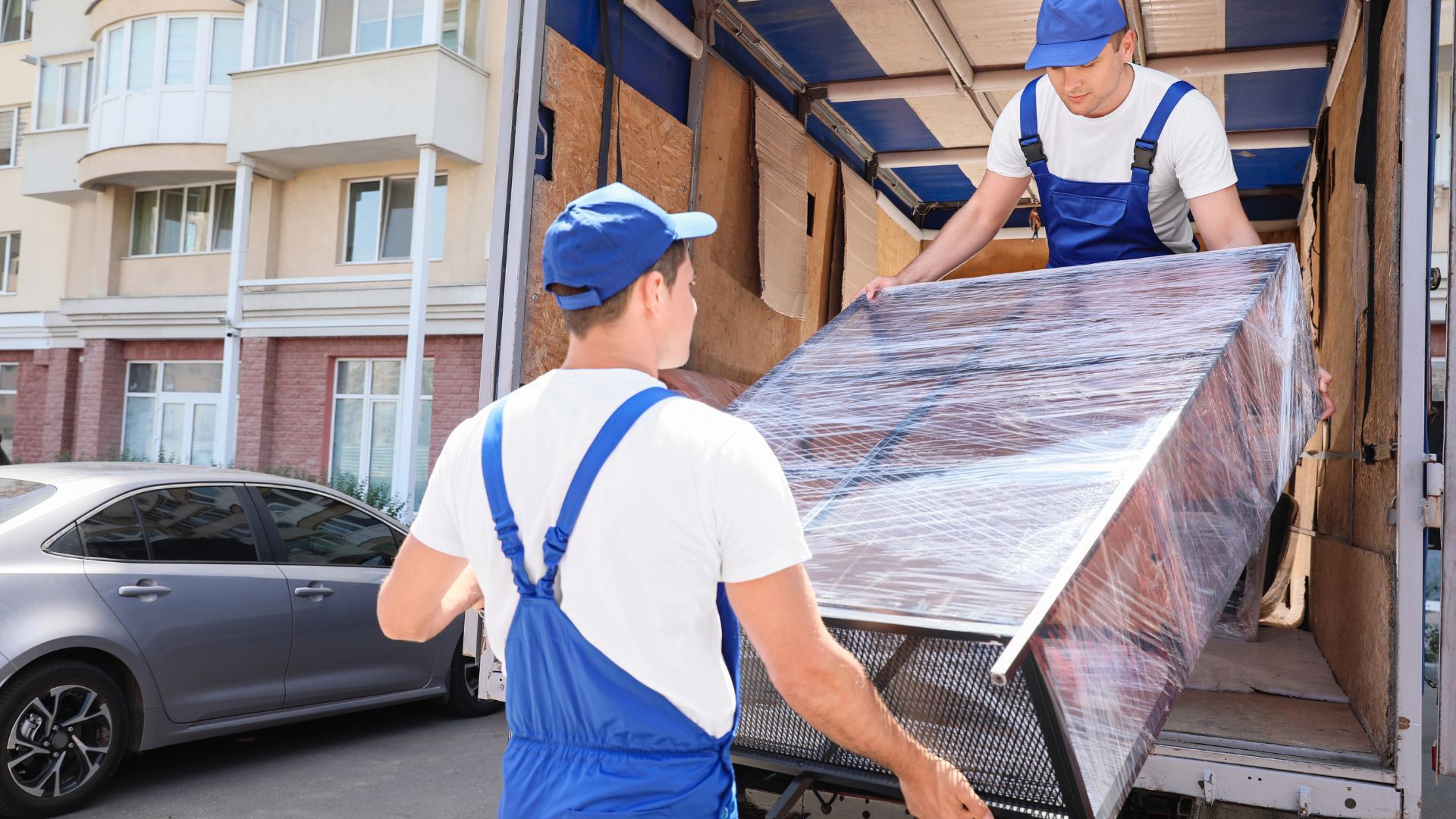 Furniture Movers deliver an Armoire in Ontario with a 24 Ft Truck  - Furniture Delivery Services Ontario