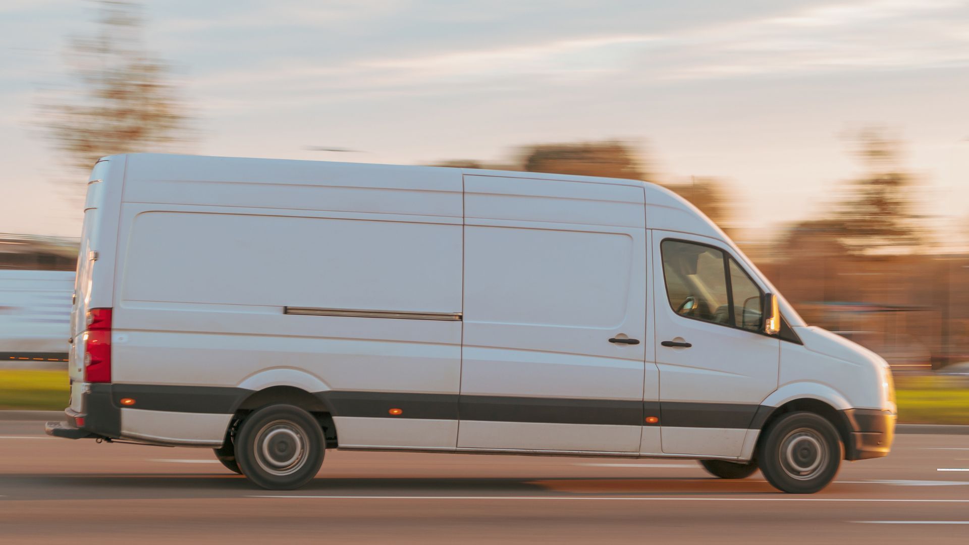 White Cargo Van Driving through Ontario for Furniture Delivery - Ontario Furniture Delivery