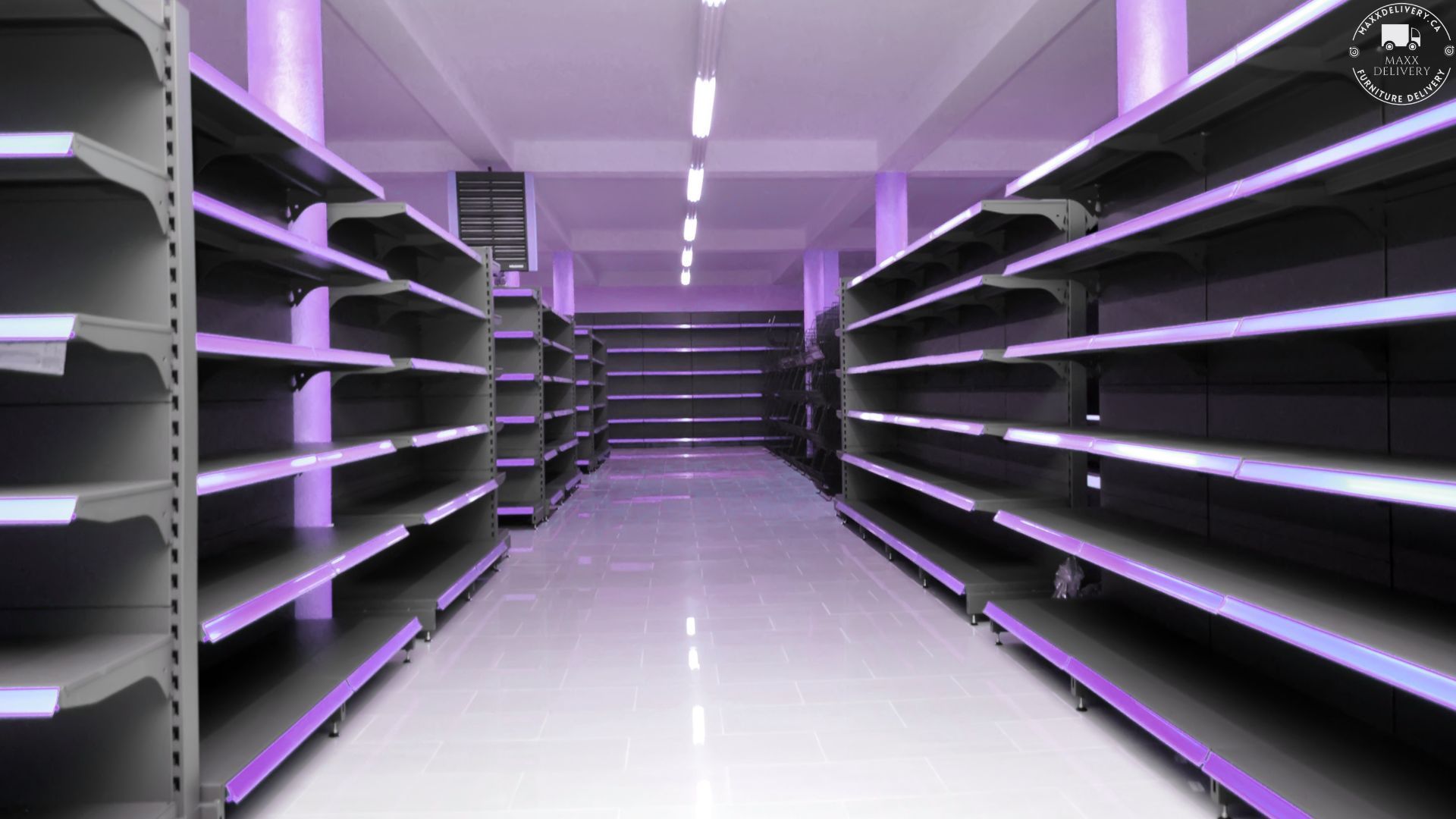 An empty store with purple lights on the shelves