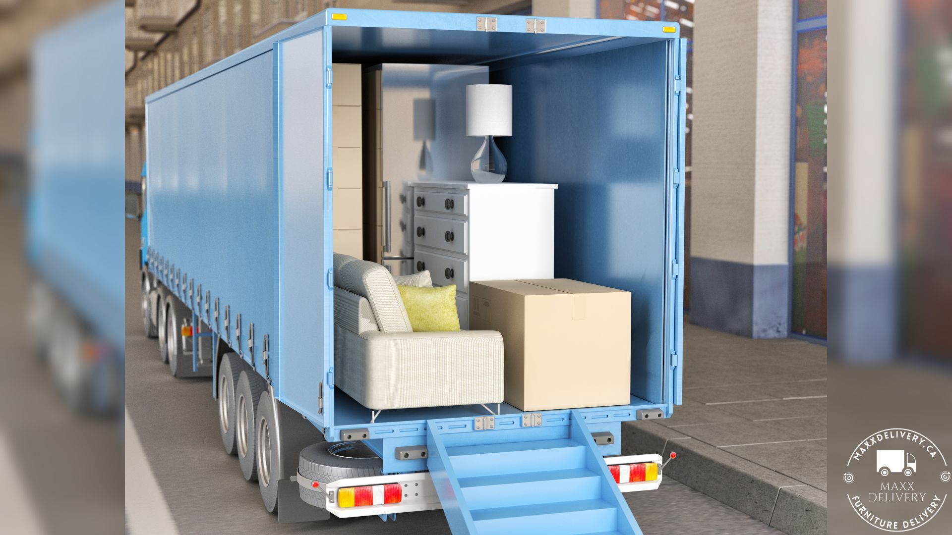 A blue truck is loaded with furniture and boxes