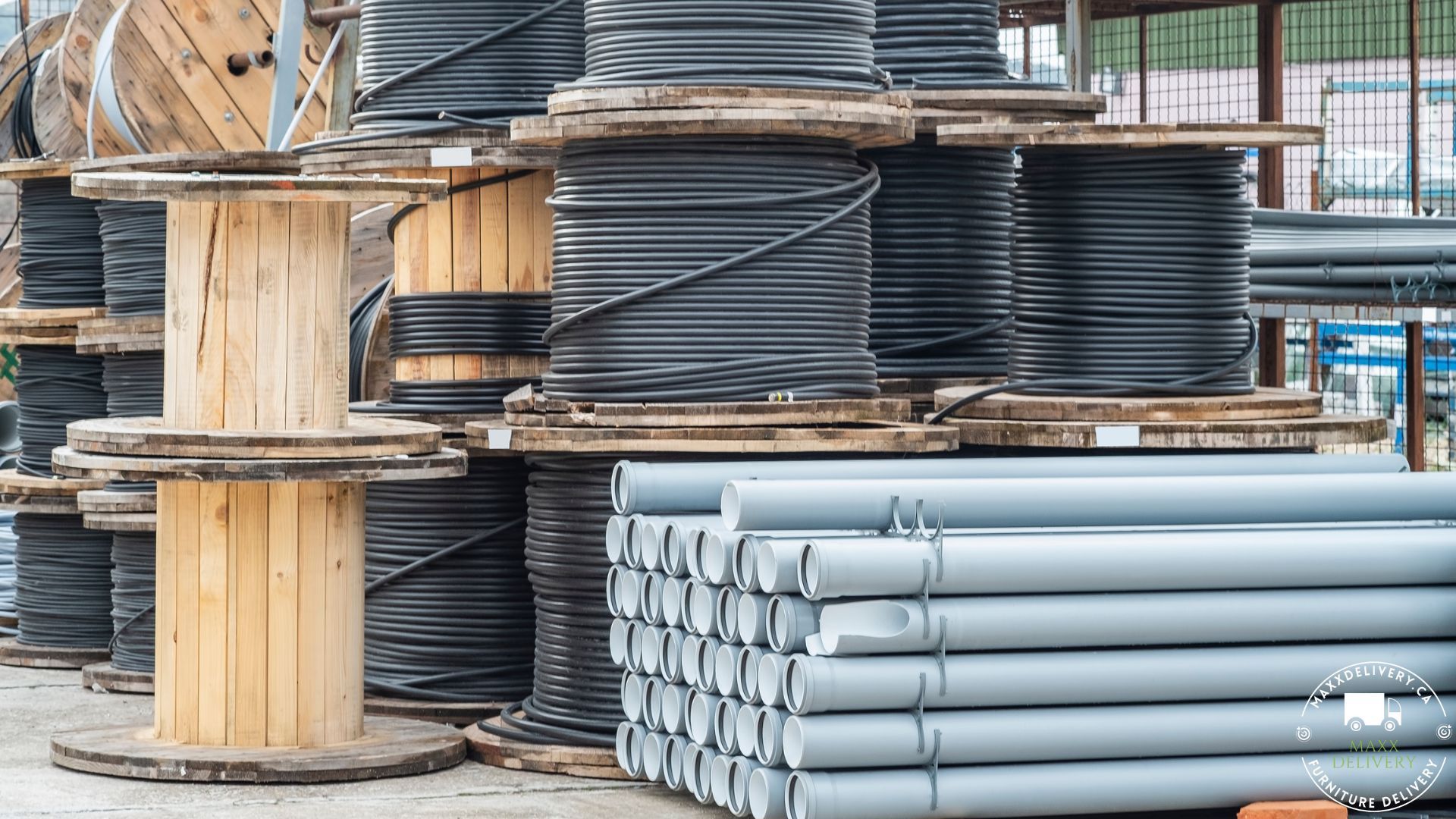 A bunch of spools of wires and pipes are stacked on top of each other