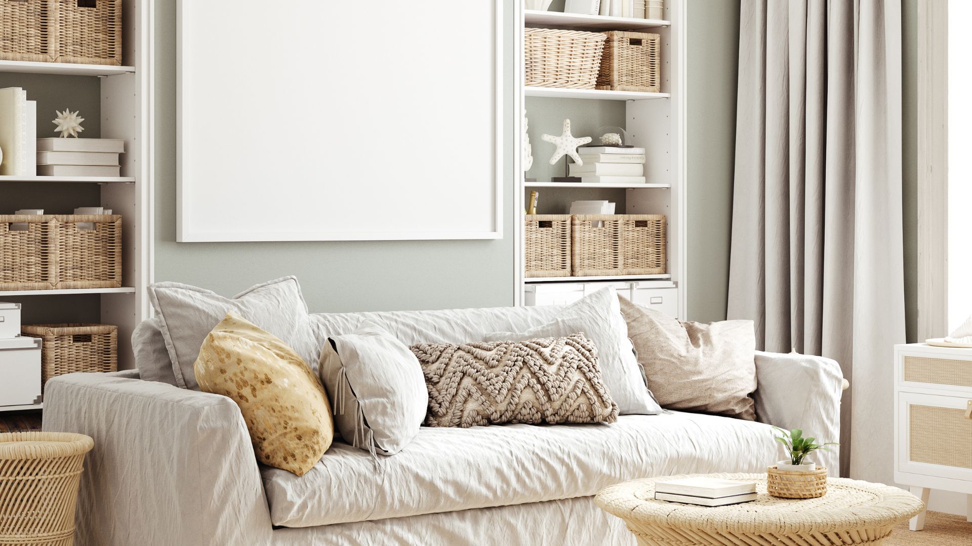 A living room with a couch , coffee table , shelves and a picture on the wall.