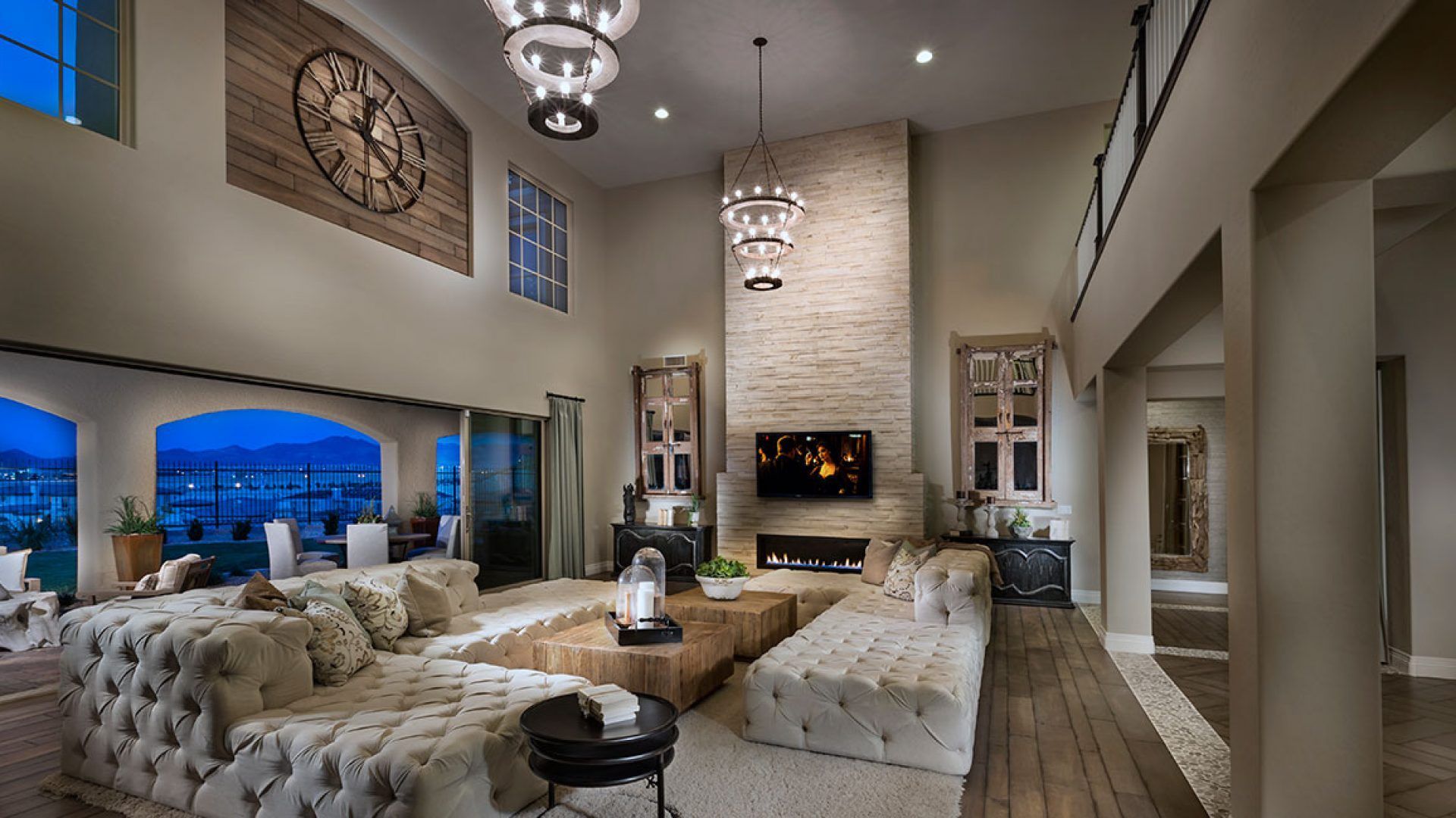 A living room with lots of furniture and a fireplace