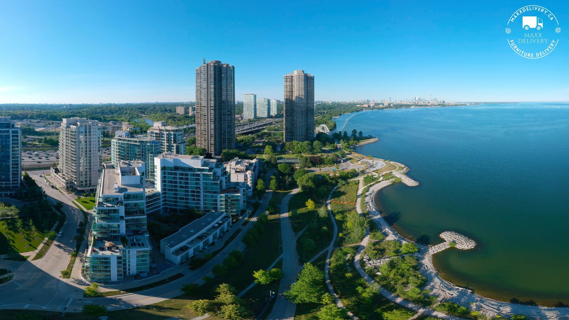 An aerial view of a city near a body of water - Furniture delivery services