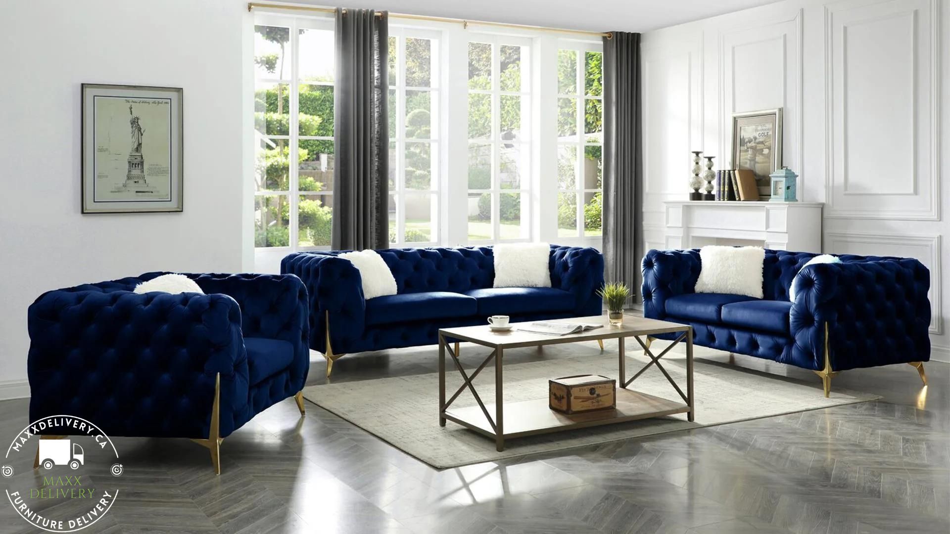 A living room with blue furniture and a coffee table