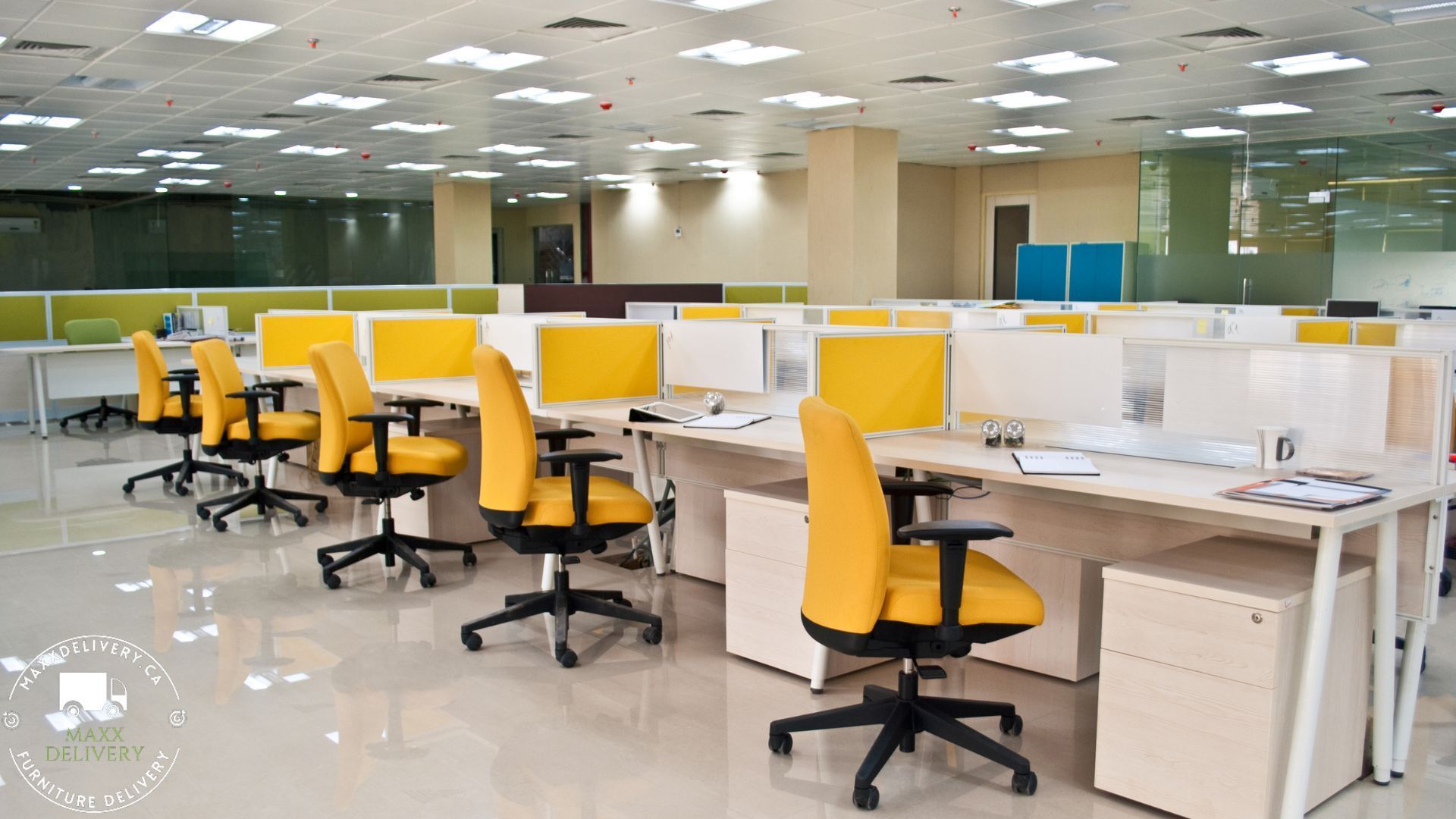 A large office with yellow chairs and desks