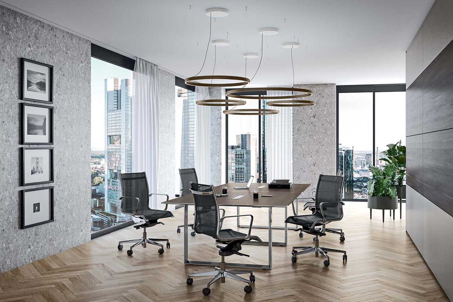 Highrise office with black premium office chairs table wood and stainless steel furniture delivered by MaxxDelivery.ca 