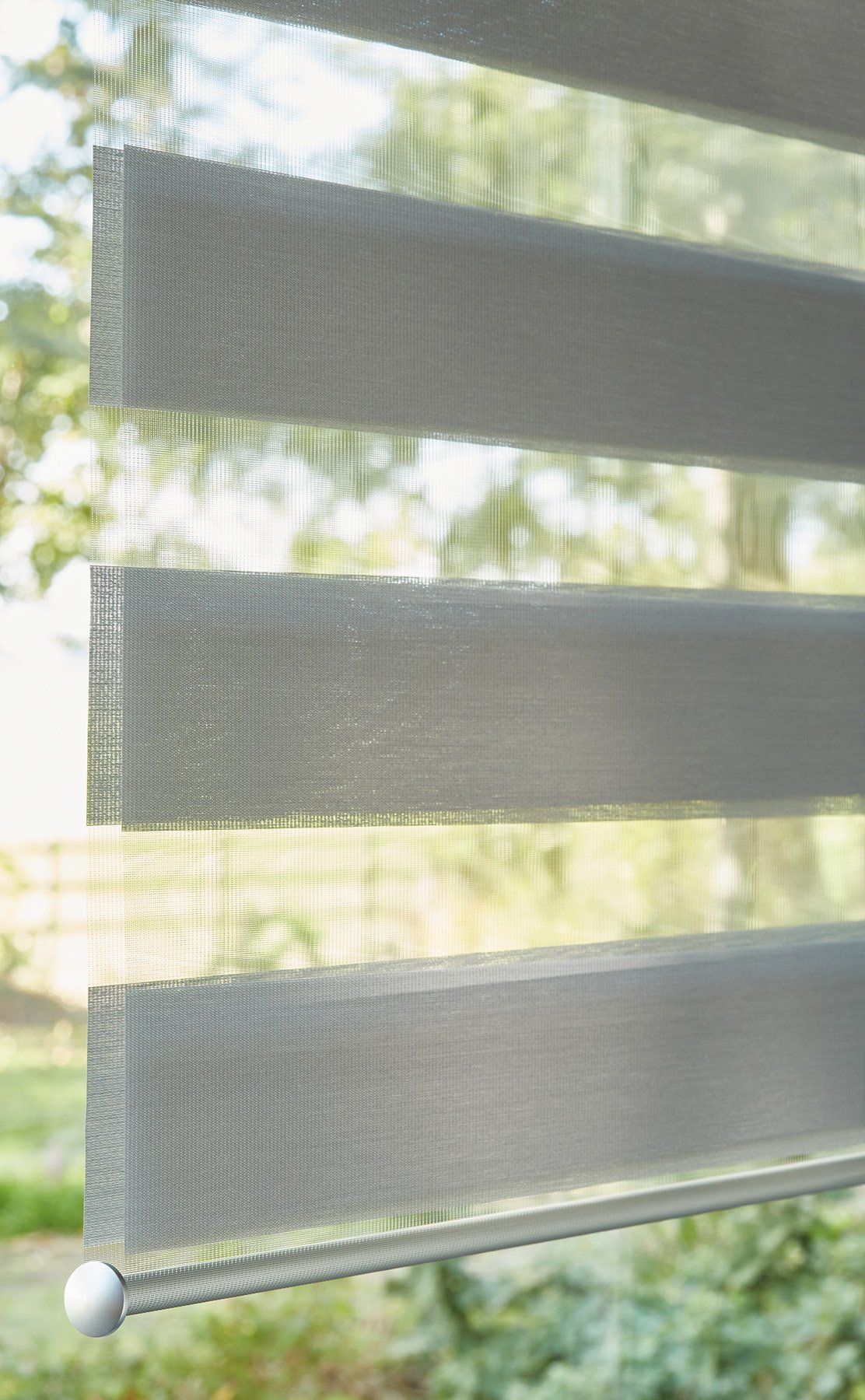 Modern grey day and night blind for privacy and light control in a Sheffield living room