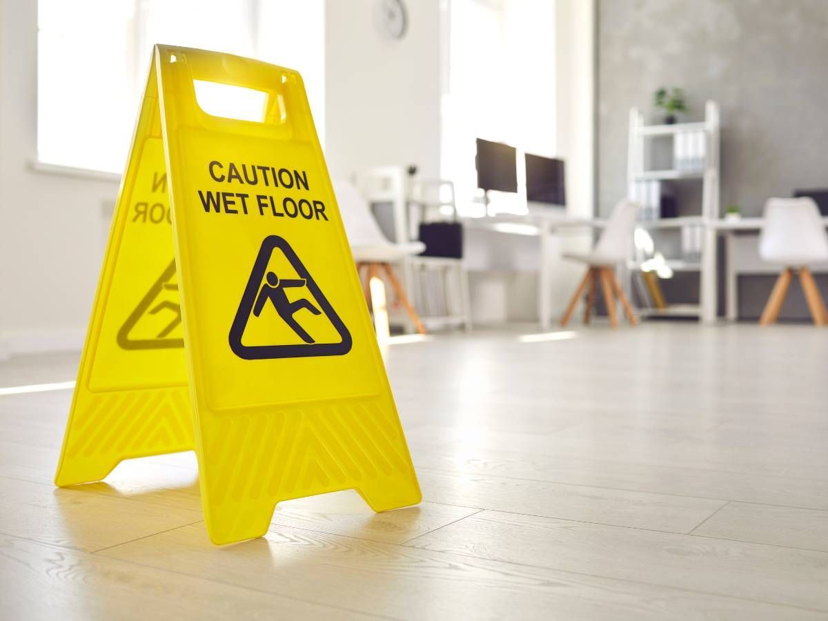 Squeaky Cleaners Nottingham wet floor sign for office staff whilst cleaning