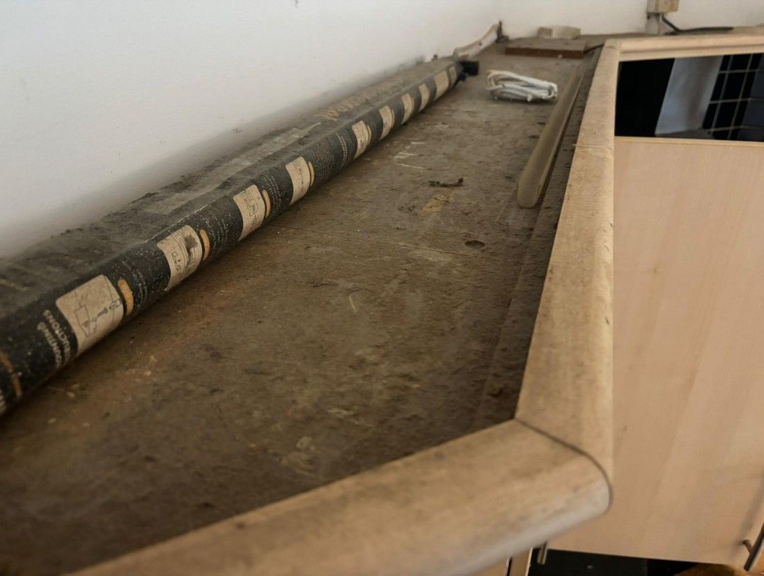 Squeaky Cleaners Nottingham before cleaning the dust and dumped items from the top of a wardrobe in Hoveringham