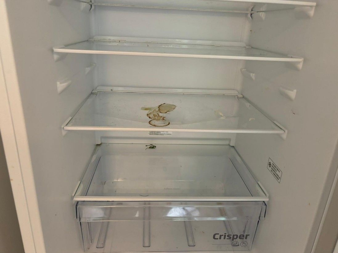 Squeaky Cleaners Nottingham before cleaning the scum from around a bathroom sink plug in Hoveringham