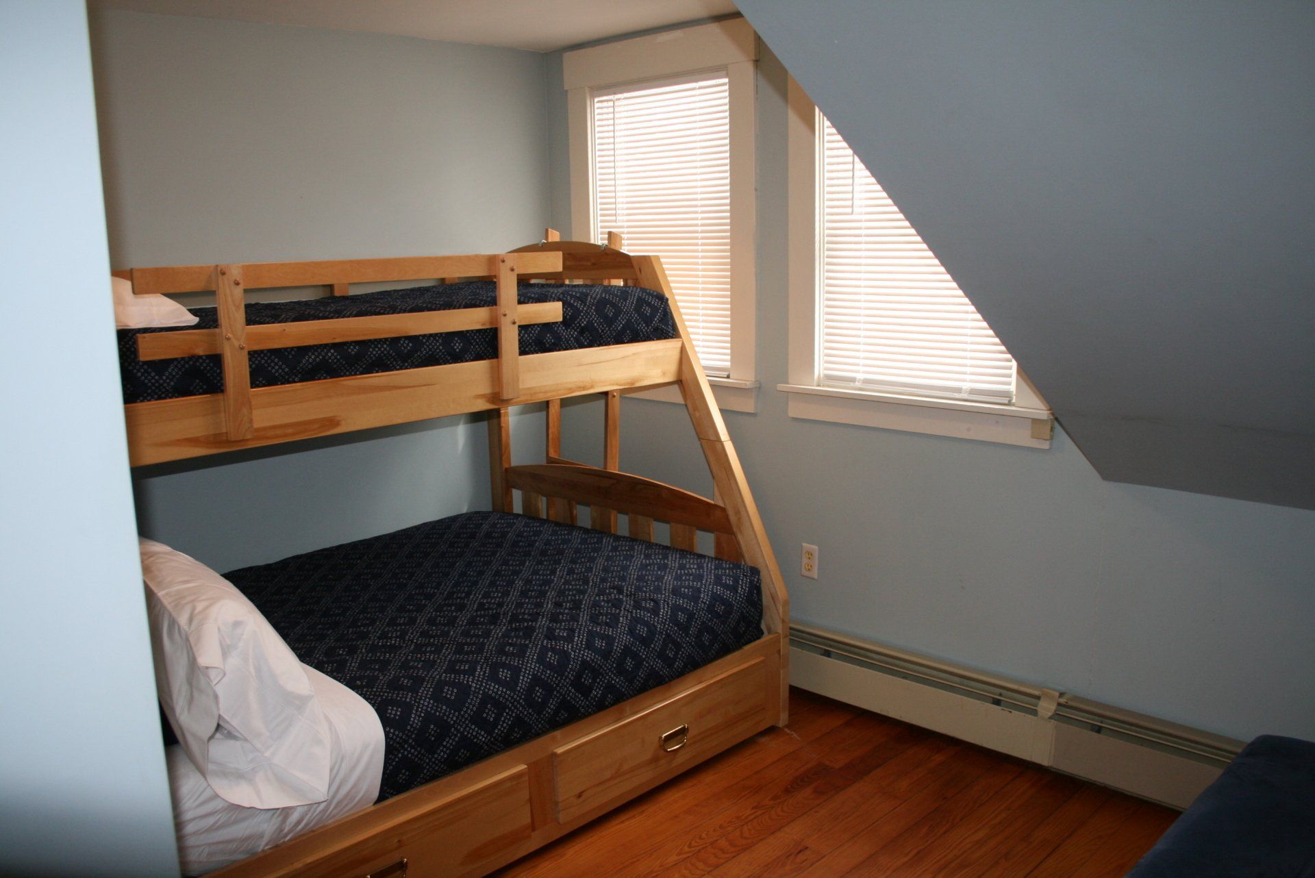 The Riverside Cottage bedroom in East Burke Vermont