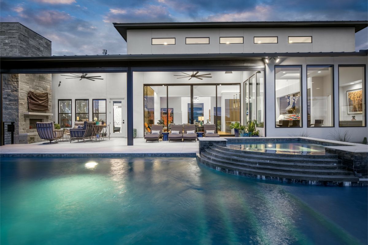 Pool Area of Luxury home showing inside of home