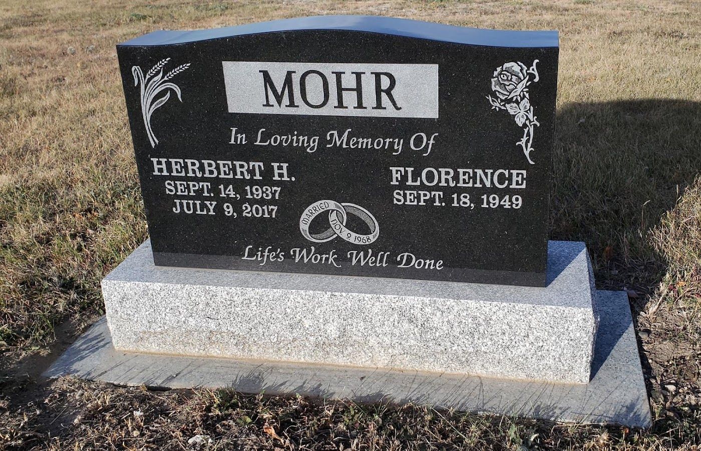 Black granite tombstone with 