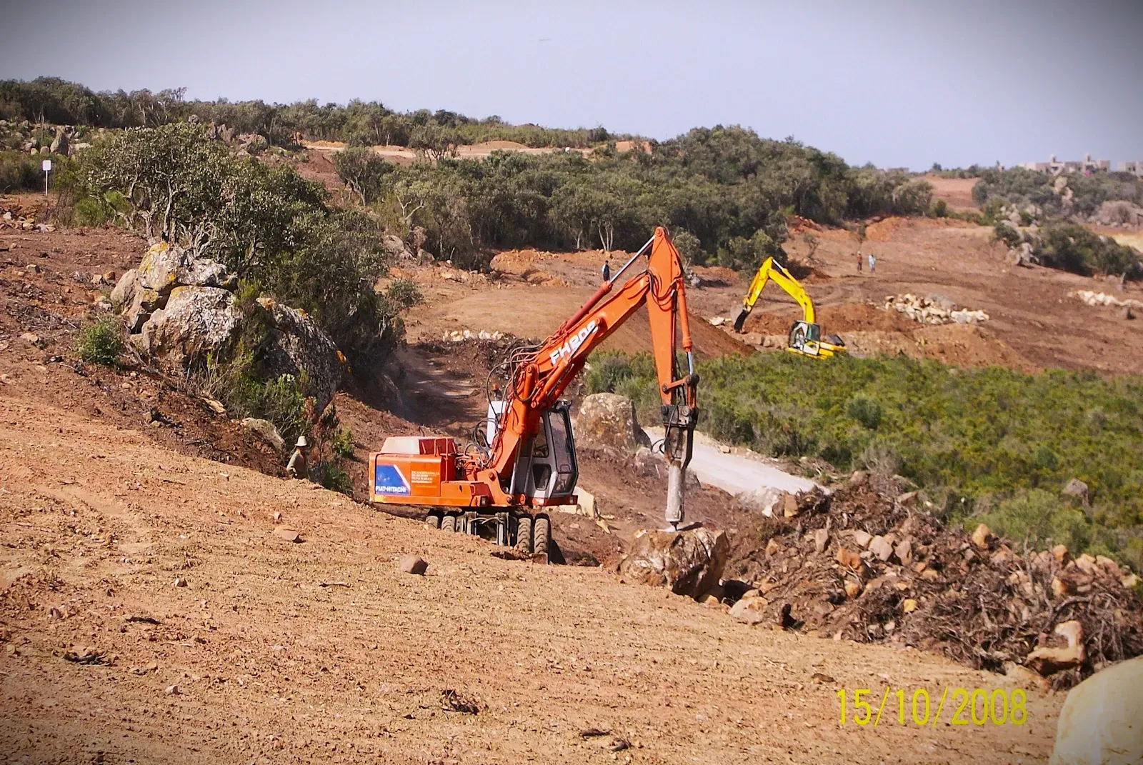 Excavators working