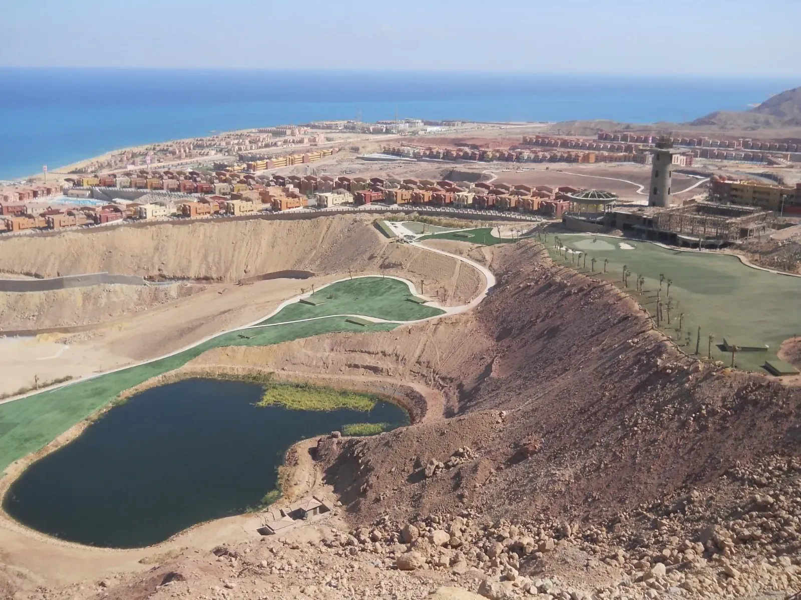View over the golf course at Porto Sokhna with irrigation lake