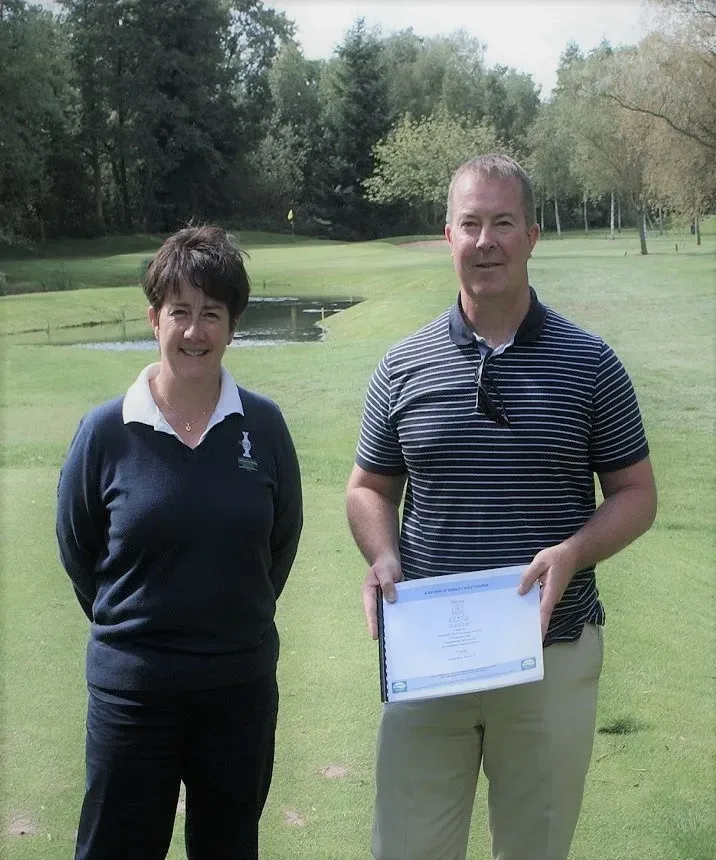Steve with golf plan next to Alison Nicholas