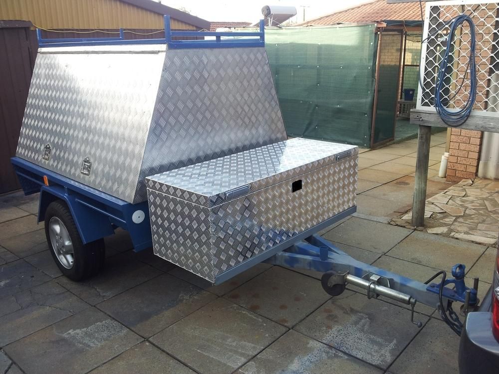 A Blue Trailer with A Stainless Steel Box on Top of It — K & S Sheetmetal in Gladstone Central, QLD