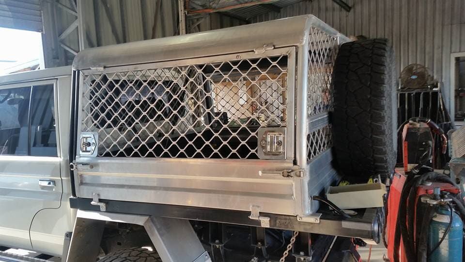 A Truck with A Cage on Top of It Is Parked in A Garage — K & S Sheetmetal in Gladstone Central, QLD