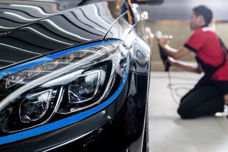 Car Mechanic Polishing A Car — Santa Fe Springs, CA — JNJ Auto Repair