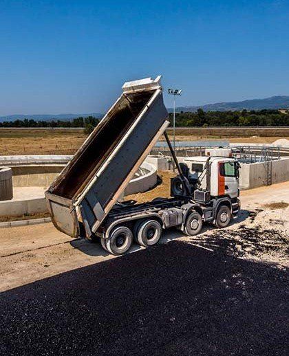 Asphalt Paving - A Truck Laying Asphalt Concrete in Fredericksburg, VA