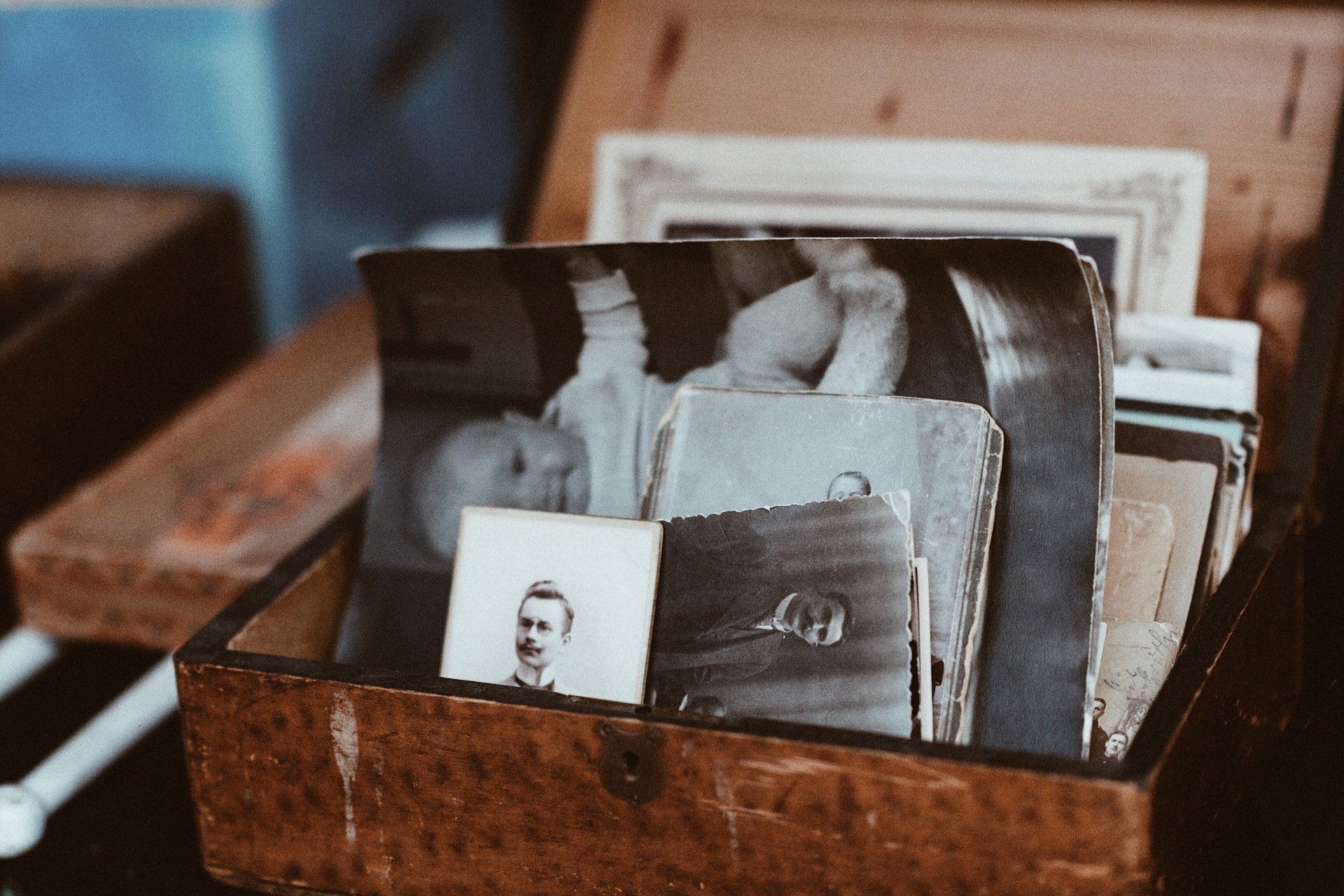 Wooden box with old photos