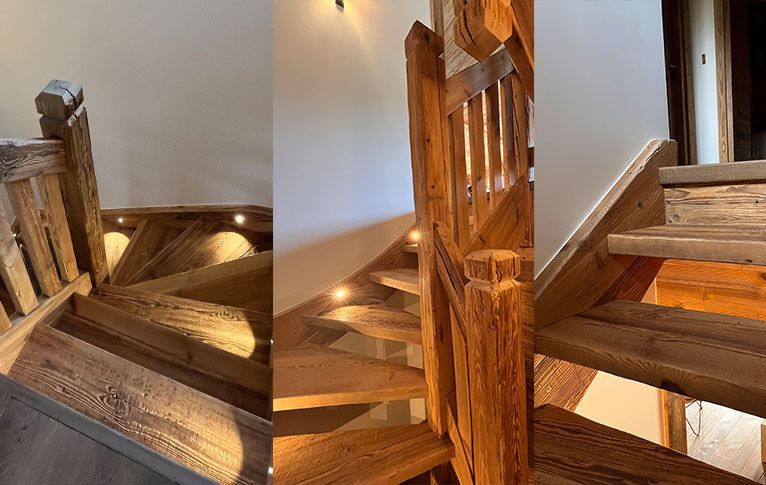 Escalier en colimaçon en bois avec éclairage intégré, mettant en valeur des détails rustiques.