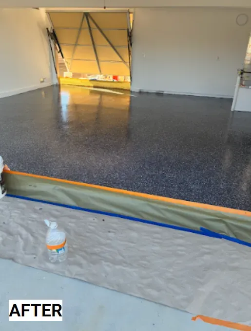 Finished epoxy floor inside a building with an open door; reflective surface.
